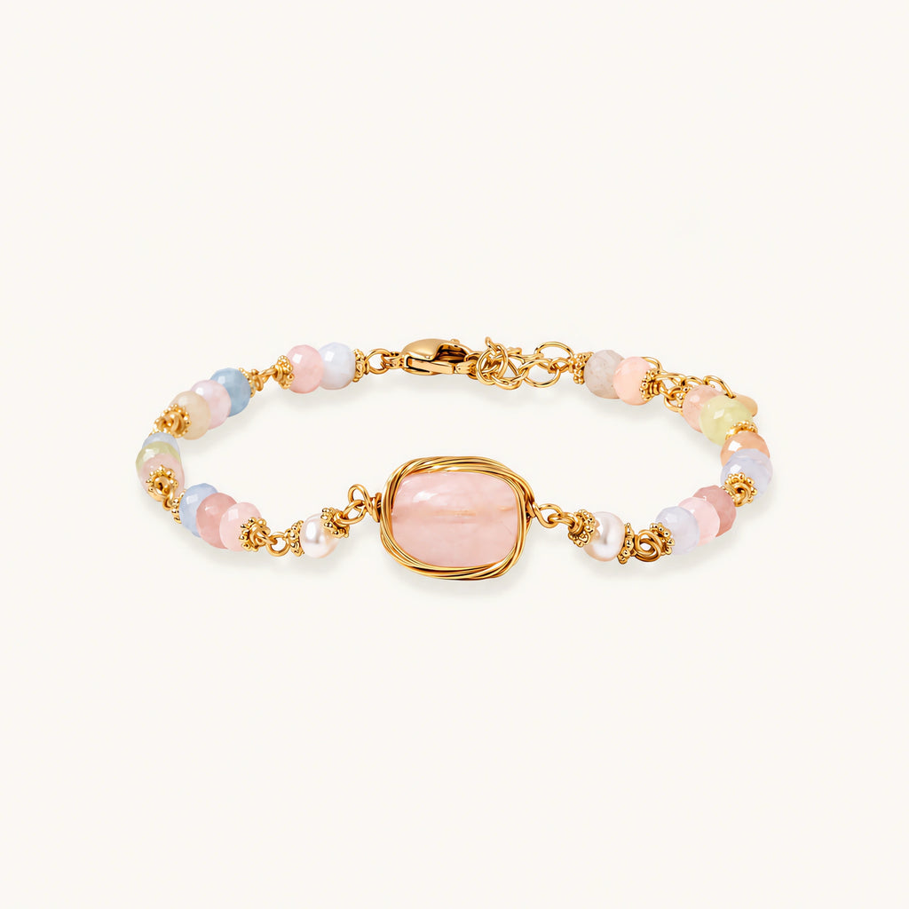 Delicate beaded bracelet with pastel rose quartz, pearls, and pink cushion-cut centerpiece in gold-plated setting