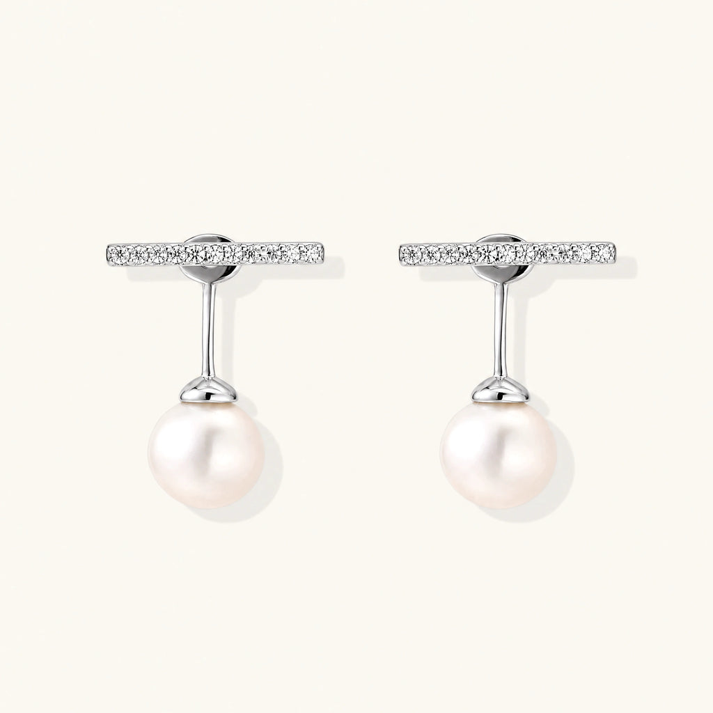 Rhodium-plated sterling silver ear jacket earrings with diamond-set horizontal bar and freshwater pearl drop
