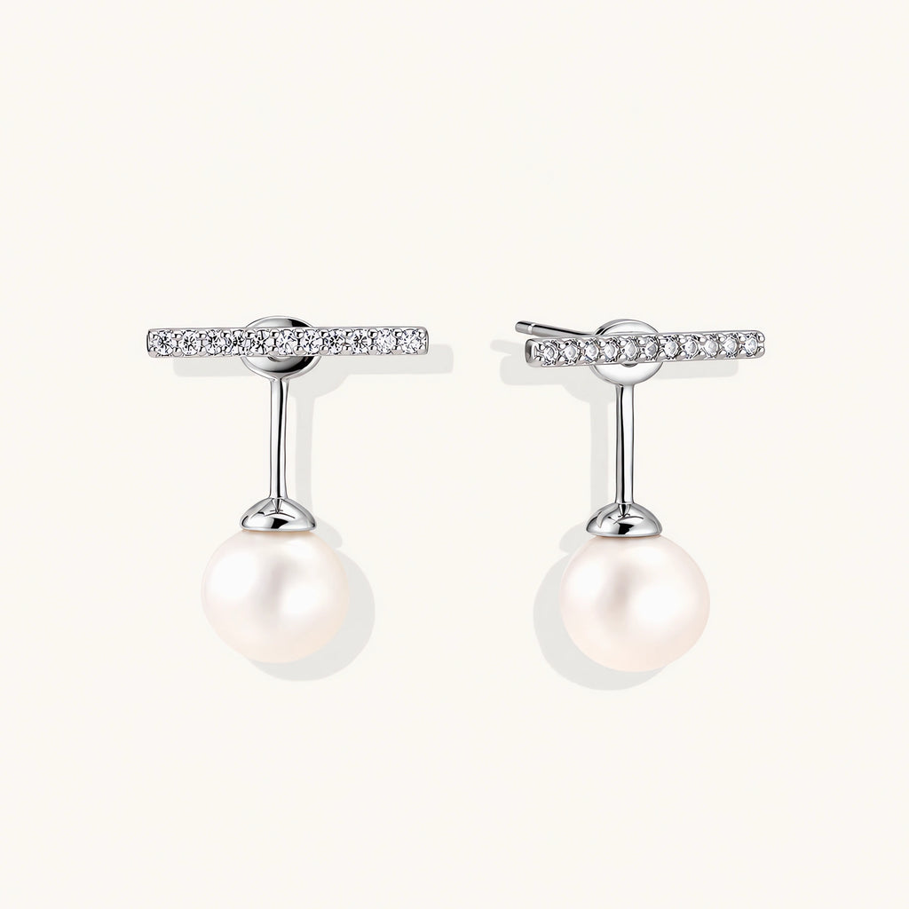Rhodium-plated sterling silver ear jacket earrings with diamond-set horizontal bar and freshwater pearl drop