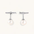 Rhodium-plated sterling silver ear jacket earrings with diamond-set horizontal bar and freshwater pearl drop