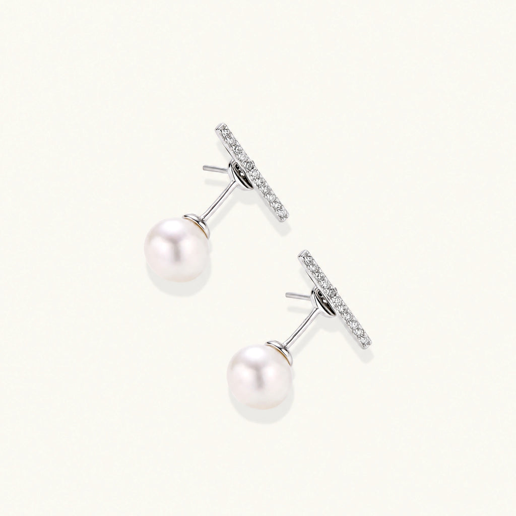 Rhodium-plated sterling silver ear jacket earrings with diamond-set horizontal bar and freshwater pearl drop